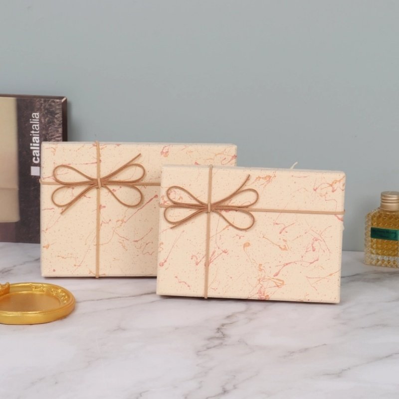 Beige marble paper gift box closed – elegant top and bottom lid design for versatile packaging