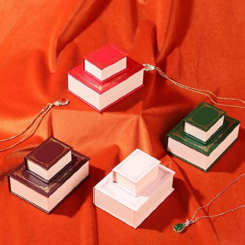 Book jewelry box opened showing necklace storage – soft anti oxidation lining for scratch protection