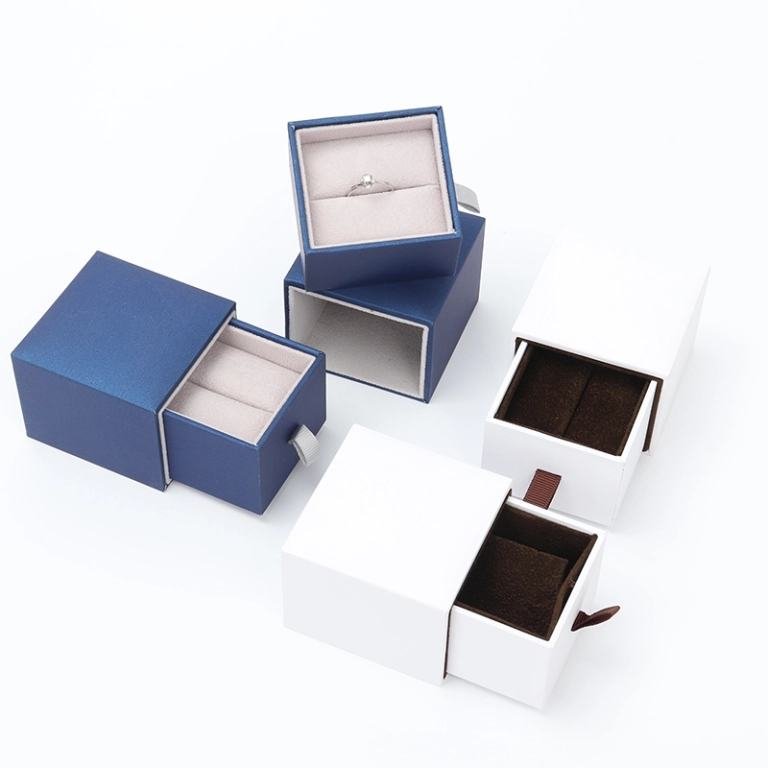 Coated paper and ivory paper surface options for custom jewelry box – various raw materials