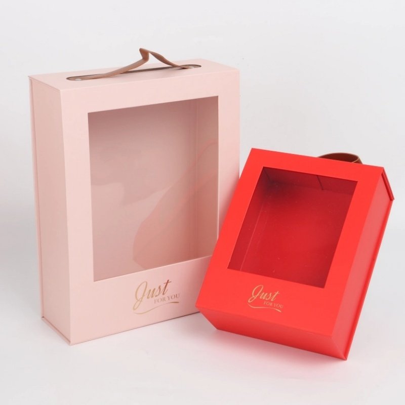 Collapsible gift box opened – PVC window clearly displays contents for clothing and cosmetics