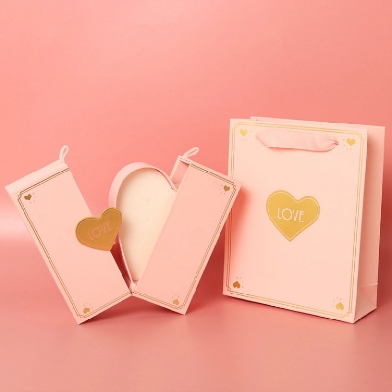 Double door opened – heart-shaped inner box with jewelry display
