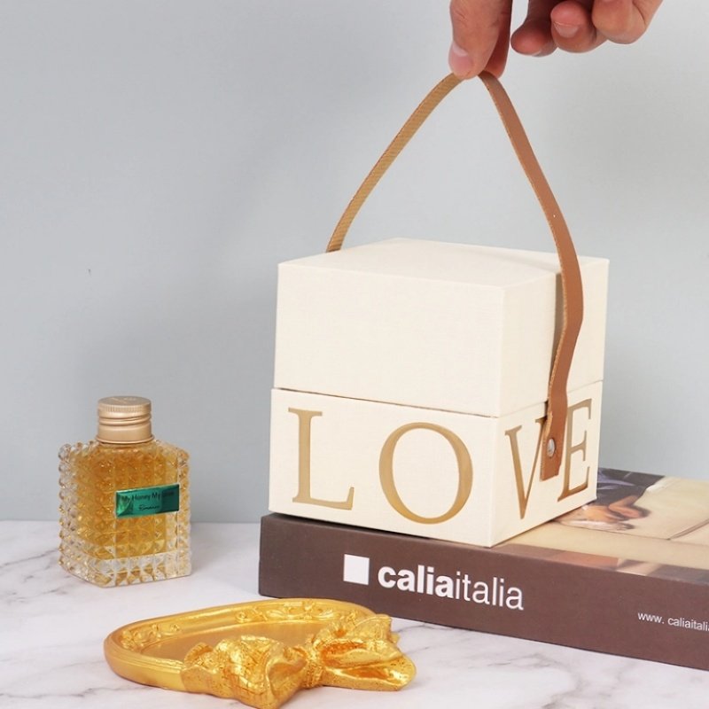 Hot stamping LOVE square wedding gift box closed – textured specialty paper with gold foil LOVE pattern for romantic packaging