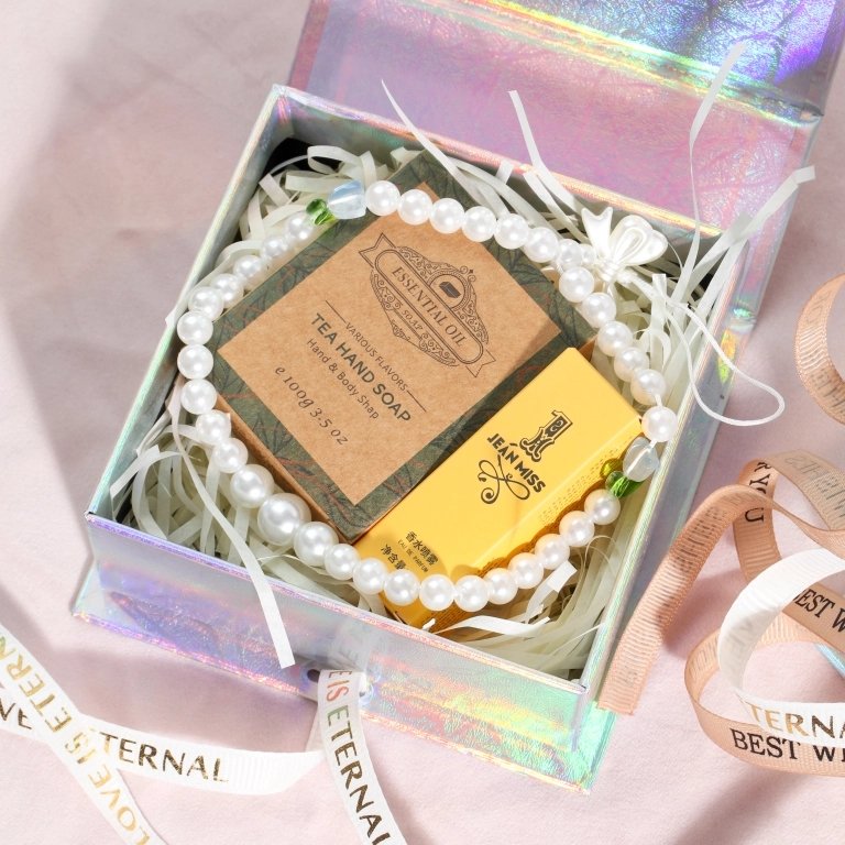 Holographic Jewelry Box with Ribbon – Custom Luxury Gift Box Manufacturer Iridescent holographic finish closeup – shimmering light reflection in spectrum of colors