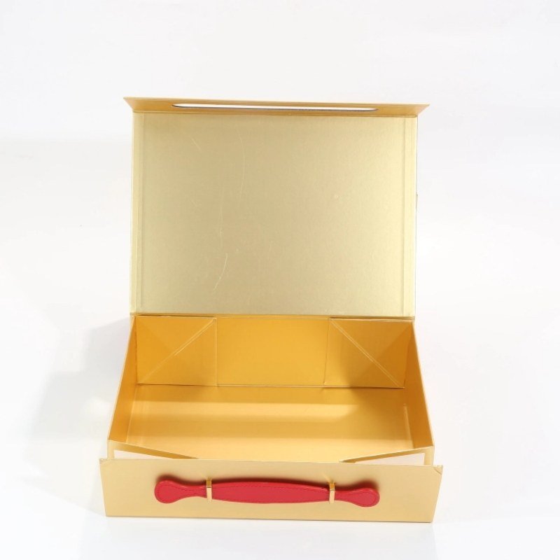 PU leather handle with gold hardware on collapsible gift box – handbag style luxury packaging
