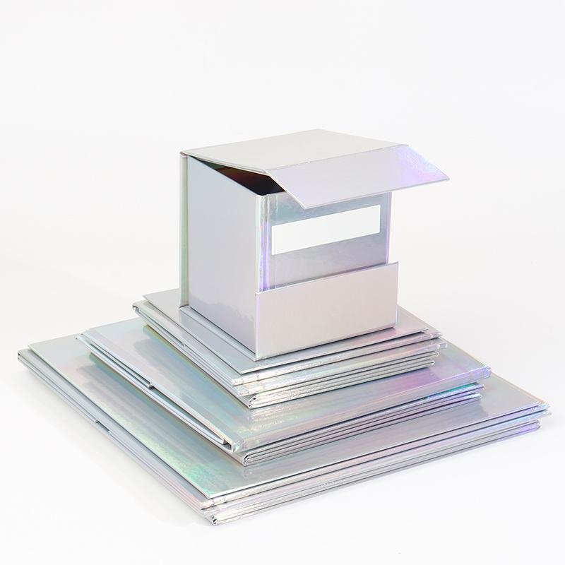 Silver cube foldable gift box closed – metallic premium finish for contemporary product packaging